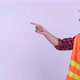 Profile View of Young Happy Hispanic Man Construction Worker Pointing Finger - VideoHive Item for Sale