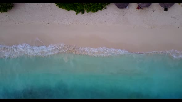 Aerial top view scenery of tropical coastline beach holiday by transparent ocean and white sandy bac