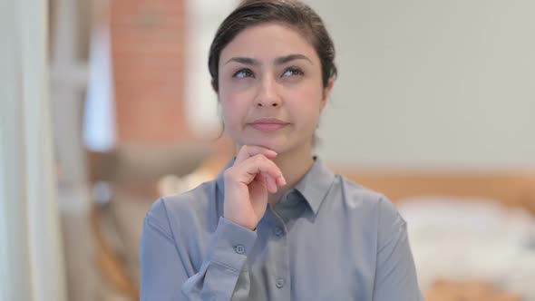 Portrait of Young Indian Woman Thinking, Getting idea