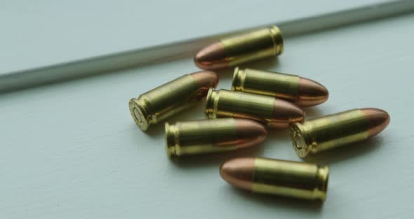 Close Up Pan Right of 9mm Handgun Bullets