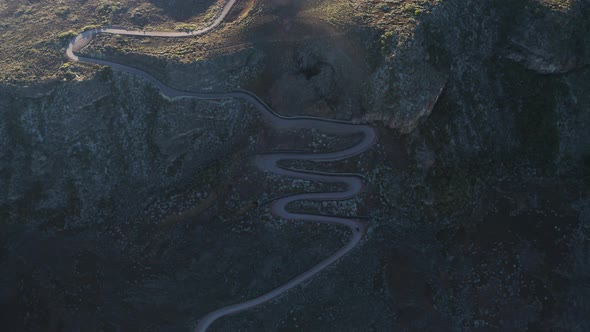 Aerial view of a serpentine road near Pas des Sables, Reunion.