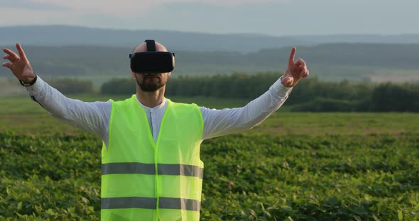 Farm Specialist Engineer Using Technology VR Monitoring Harvest Working for Agriculture Productivity