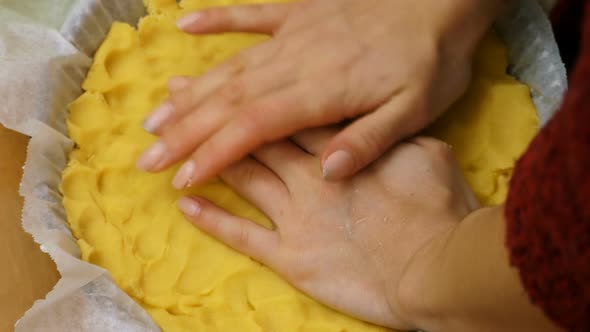 making the pie - working on the raw dough