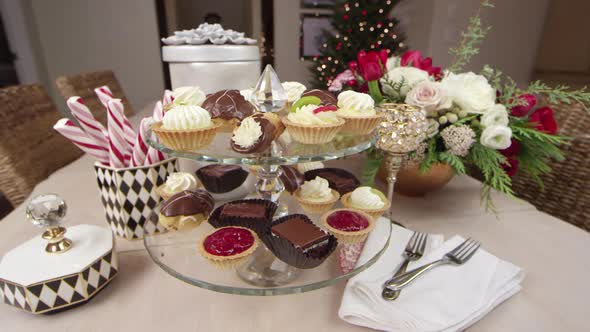 An assortment of delicious desserts decoratively displayed for a Holiday/Christmas party