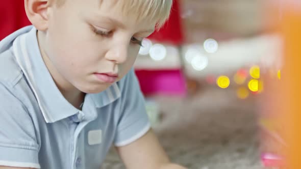 Talented Little Boy Drawing on Handmade Gift Card