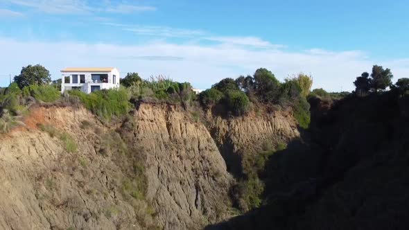 Fantastic aerial drone flight slowly rise up drone shot from bottom of a canyon over the cliff to vi