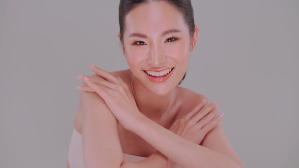 Beautiful face of Asian young woman with natural skin. Portrait of attractive girl with soft make-up