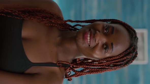 Verical Video Portrait of Black Woman Smiling and Looking Into Camera During Fitness Morning Workout