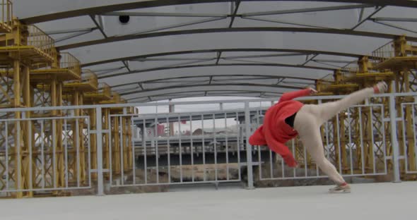 Boy Freerunning at Construction Site