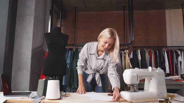 Young Talented Designer Creating Outfit