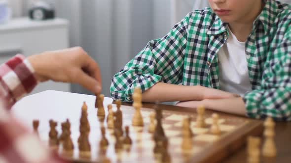 Father Teaching Son to Play Chess, Development of Logical Thinking, Family Hobby