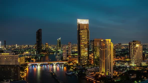 Time lapse night cityscape and high-rise buildings in metropolis city center