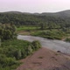 Top view of summer green trees in forest with a splendid mountain river in Carpathian Mountains - VideoHive Item for Sale
