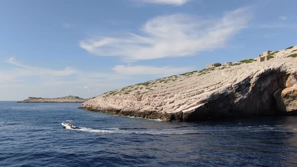 Speedboat passing Mana Island in Kornati National Park, Croatia, Europe