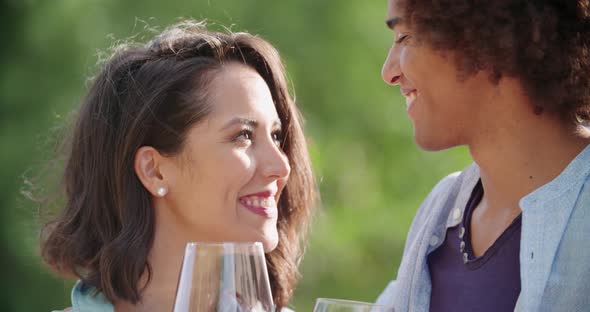Romantic Young Woman and Man Tasting Wine Having Exciting Private Degustation at Italian Vineyard