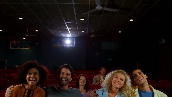 Couple watching movie in theater