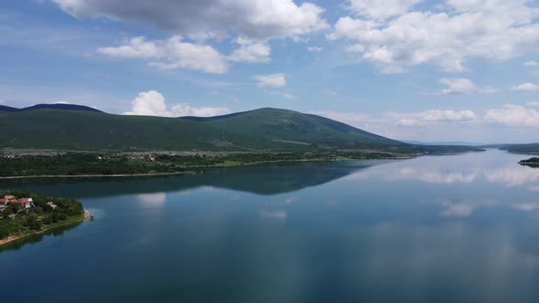 A lake in northern Croatia surrounded by greenery and mountains. This lake lies very close to the Bo
