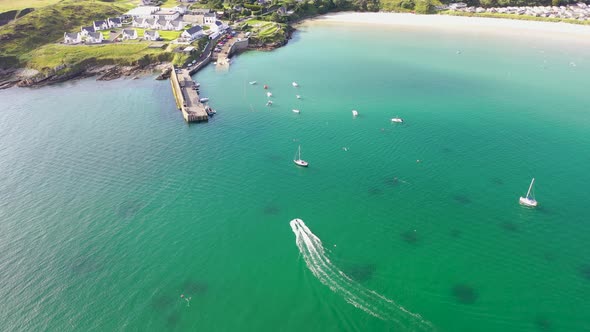 Aerial of Jet Ski Driving on the Atlantic Ocean in Dwoning County Donegal  Ireland