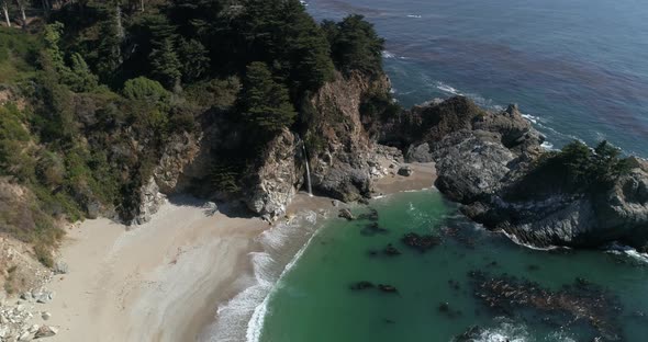 Aerial Slow Motion view of Water Fall McWay Falls Julia Pfeiffer Burns Park Big Sur California