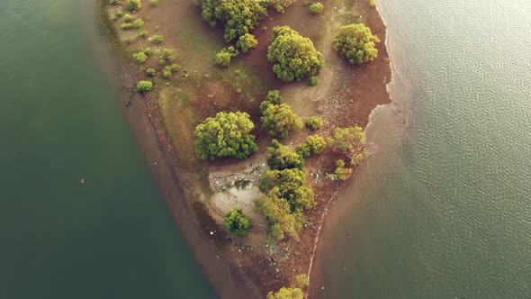 Aerial View on Sunset on Riverbed and Small Bird Island in Goa.