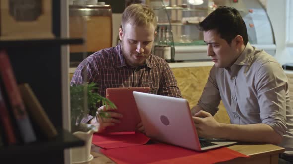 Business Meeting in Coffee Shop