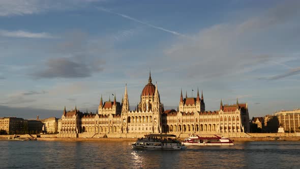 Sunset with cruise ships and the Hungarian Parliament Building
