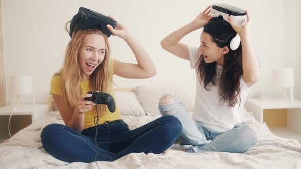 Exited Girls in VR Helmets at Home