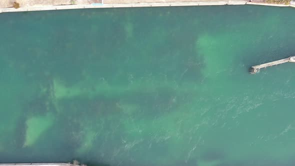 A top down view directly above the Shinnecock Canal in Hampton Bays, Long Island, NY. The drone came