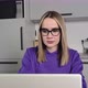 Annoyed Young Adult Woman in Glasses Work Study at Kitchen Using Laptop - VideoHive Item for Sale