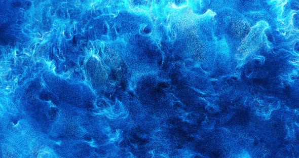 Abstract turbulent and flowing water or blue liquid particles.  alt