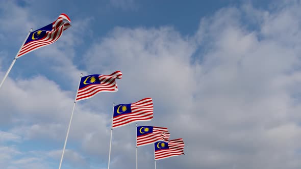 Waving Flags Of The Malaysia blue sky