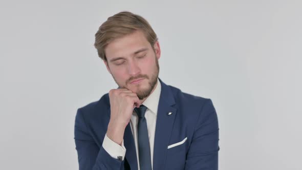 Young Businessman Sleeping on White Background