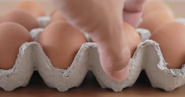 Hand pick eggs from package