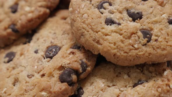 Tasty chip cake cookies with chocolate pieces shallow DOF close-up 4K 2160p 30fps UHD tilting  foota