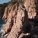 Flying above big rocks, waves, seagulls and a kayak - VideoHive Item for Sale
