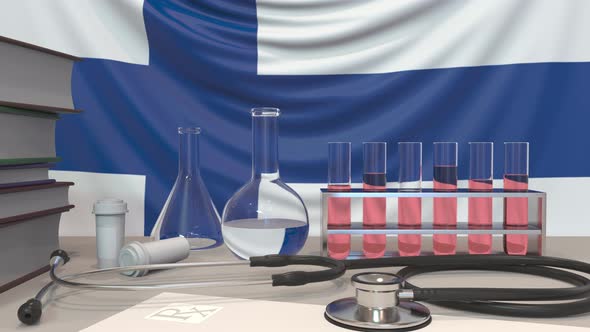 Clinic Laboratory Equipment on Finnish Flag Background