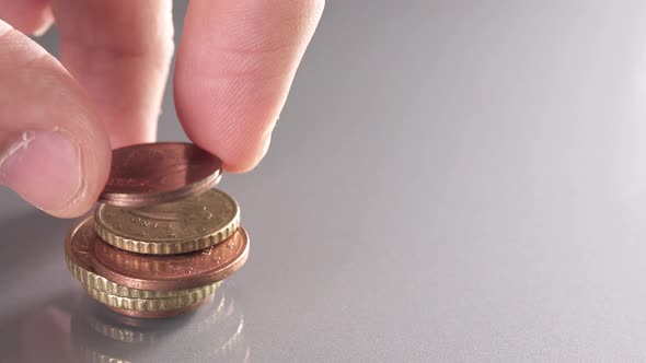 Piling Up Euro Coins with Different Sizes