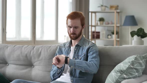 Man Using Smartwatch