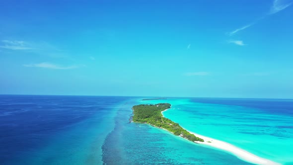 Daytime drone island view of a white sand paradise beach and turquoise sea background in best qualit