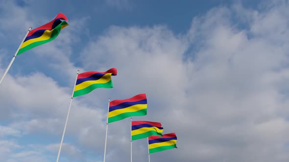 Waving Flags Of The Mauritius blue sky