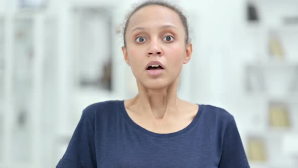 Portrait of Upset African Woman Feeling Shocked 