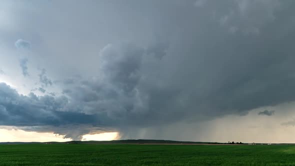 Time lapse of tornado touching ground behind rainstorm in Nebraska