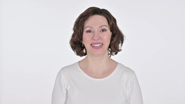 Old Woman Smiling at the Camera on White Background