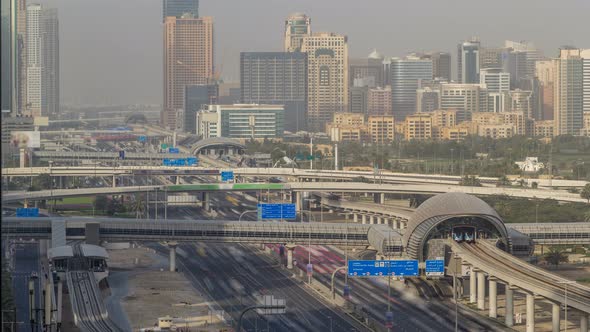 Aerial View of Jumeirah Lakes Towers Skyscrapers and Al Barsha District Timelapse with Traffic on