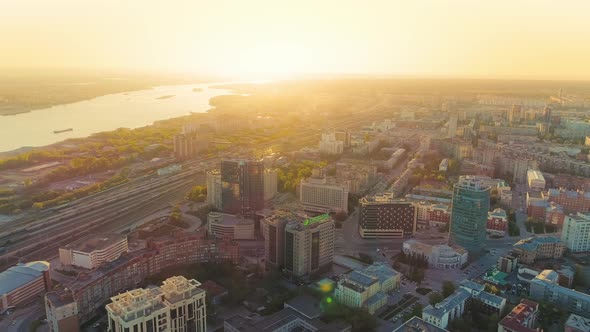 Aerial View of Beautiful Sunset in a Big City on the River