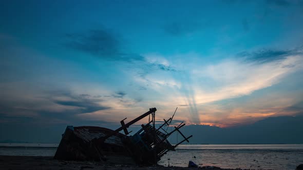 time-lapse of local fishing boat on tropical beach sunset, Thailand : 4k