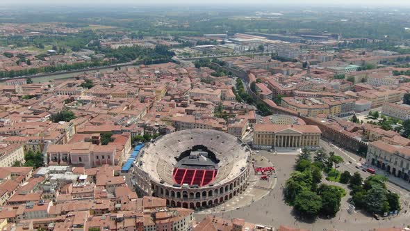 Flying over Arena - Roman amphitheatre in Verona city, Italy, Europe