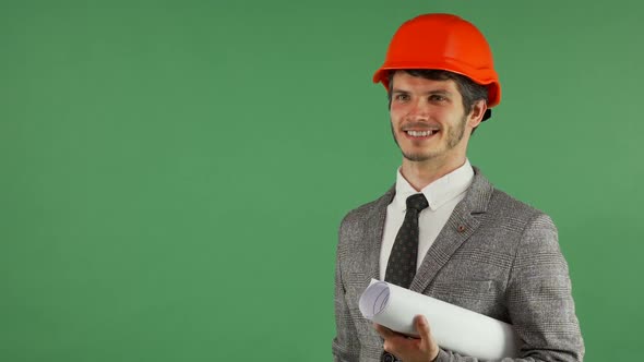 Cheerful Handsome Engineer Holding Copy Space on His Hand 1080p