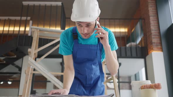 Stressed Angry Anxious Builder Arguing on the Phone with Contractor