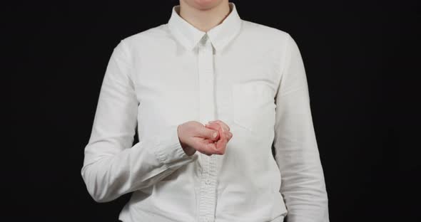 Woman making money gesture